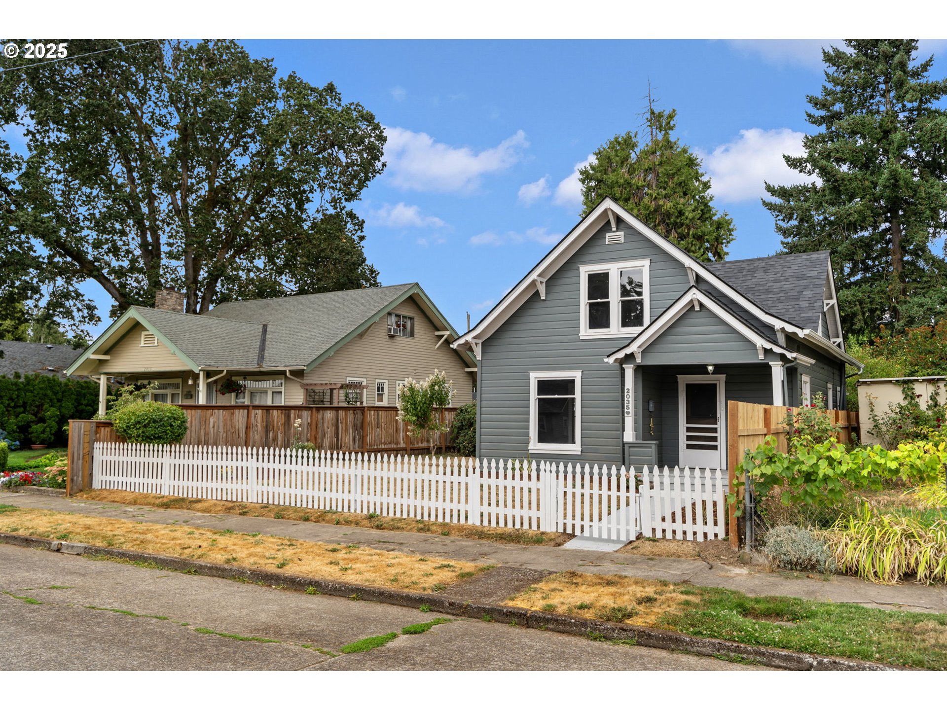 2035 4th Street Northeast Salem, OR 97301 - Photo 38 of 45 a house that has a tree in front of it
