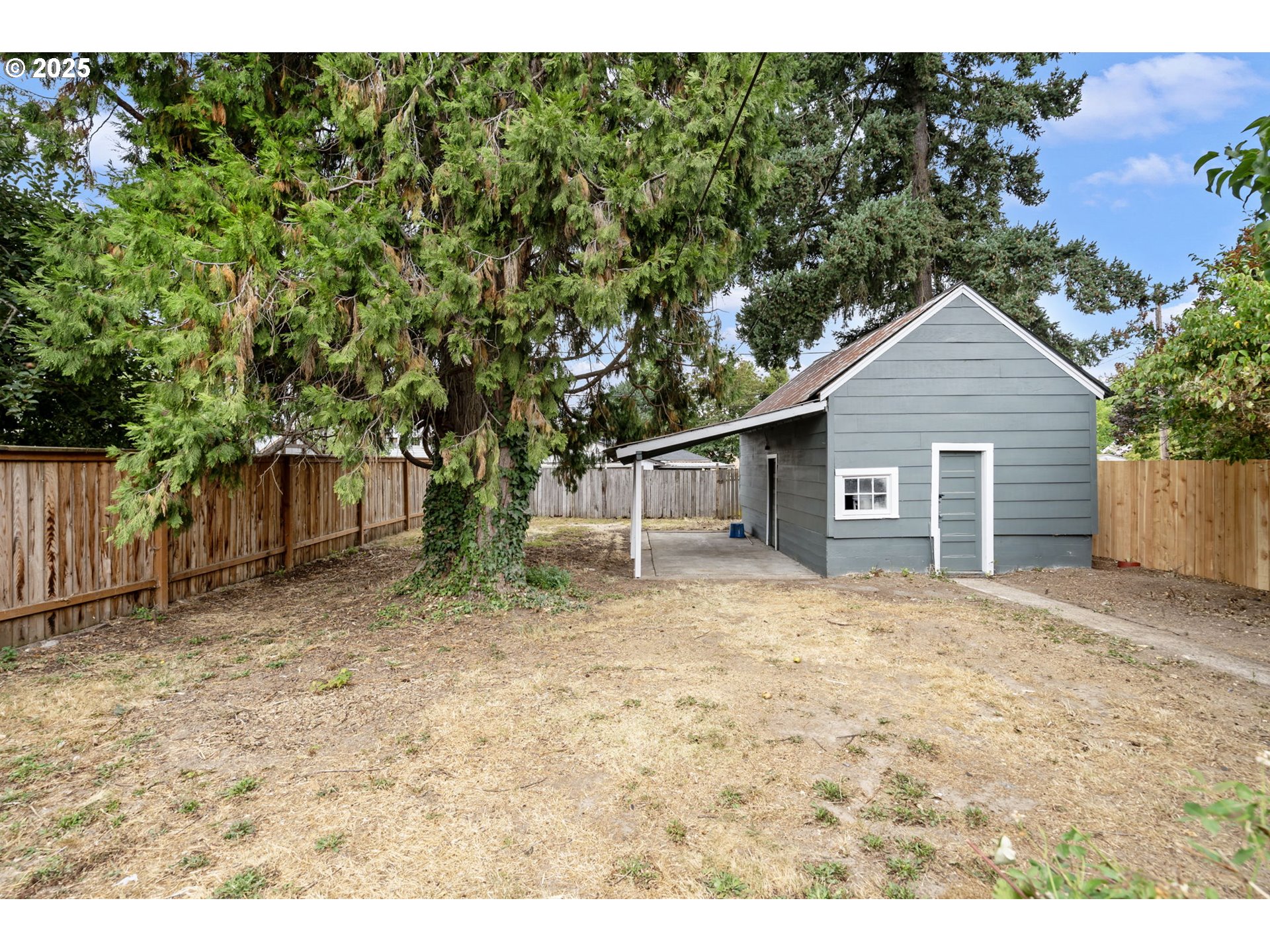 2035 4th Street Northeast Salem, OR 97301 - Photo 40 of 45 a house with a tree in the background