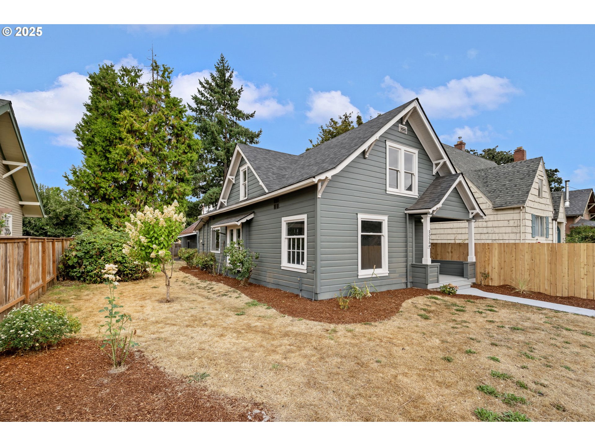2035 4th Street Northeast Salem, OR 97301 - Photo 44 of 45 a house with trees in the background