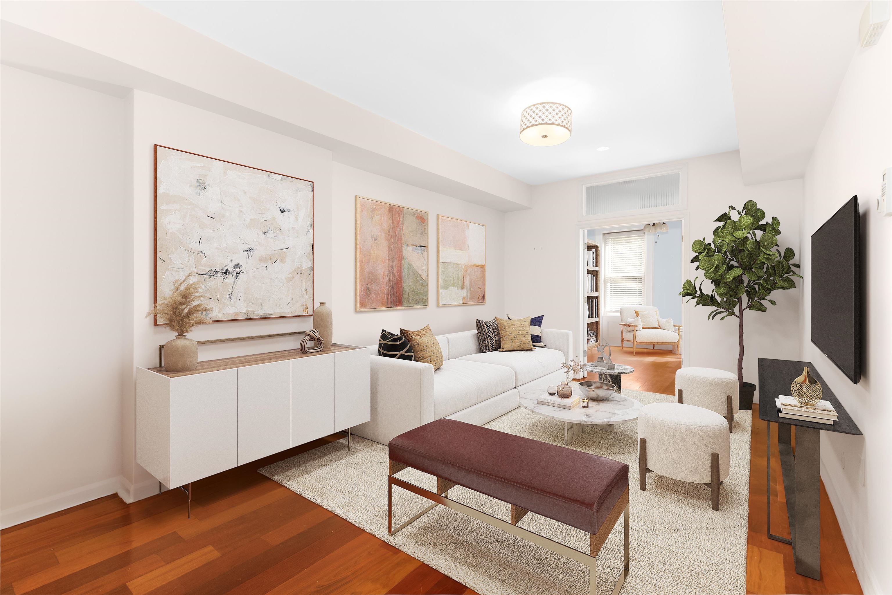 a living room with furniture a flat screen tv and a large window