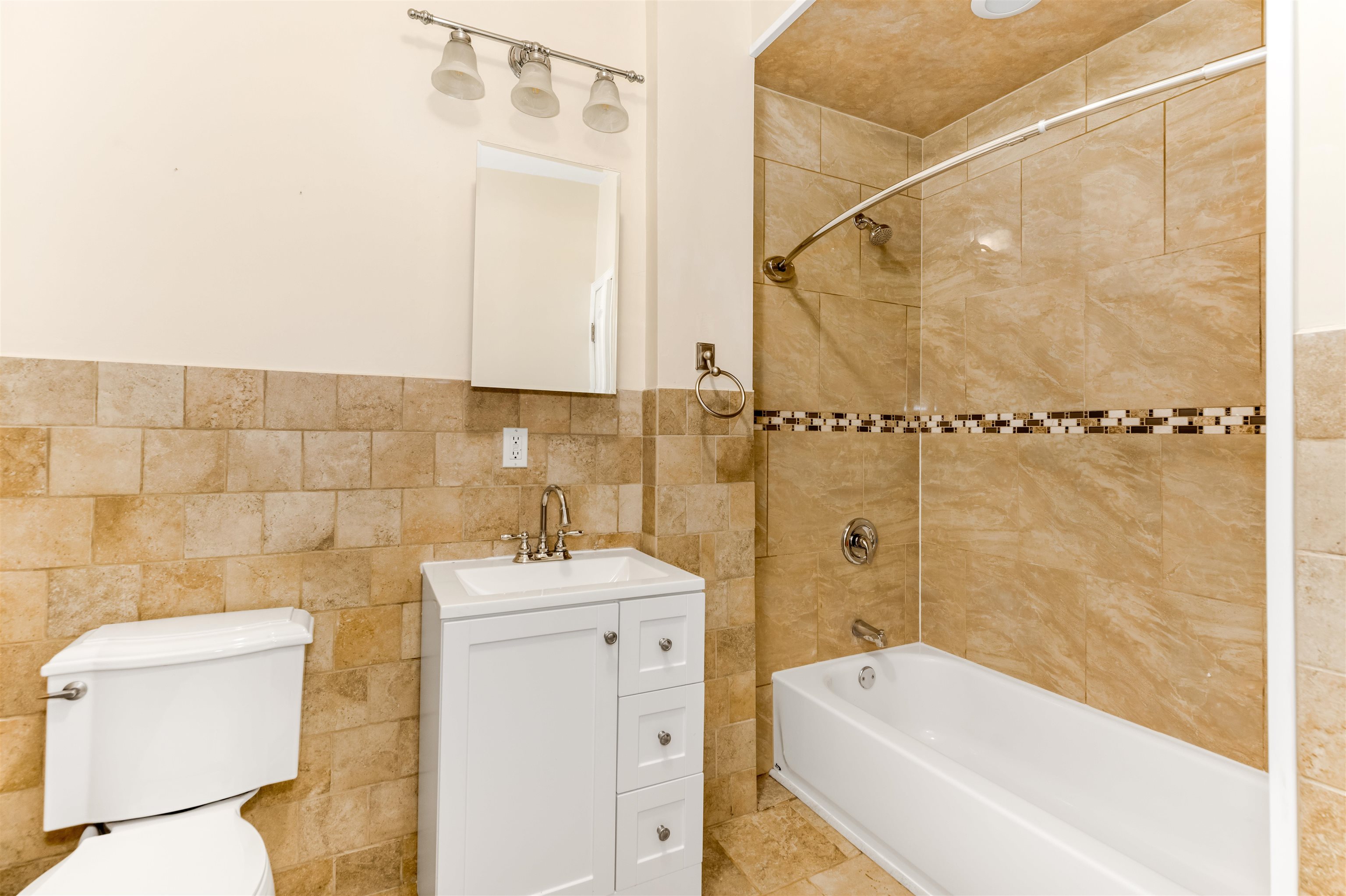 228 Jefferson Street, Unit 2 (R) Hoboken, NJ 07030 - Photo 13 of 15 a bathroom with a sink a toilet and shower
