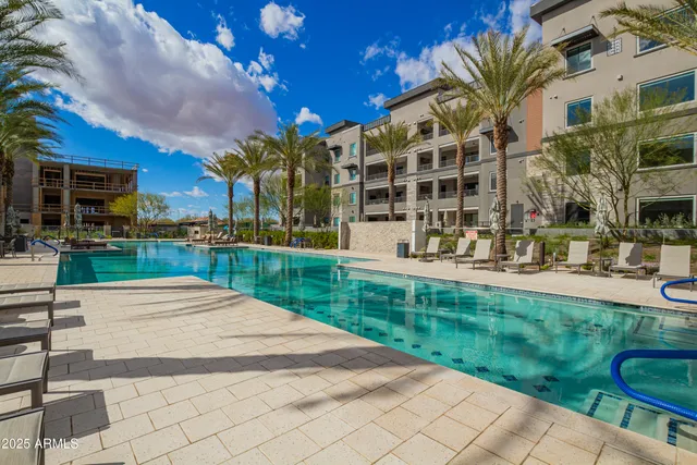 a view of a building with a yard