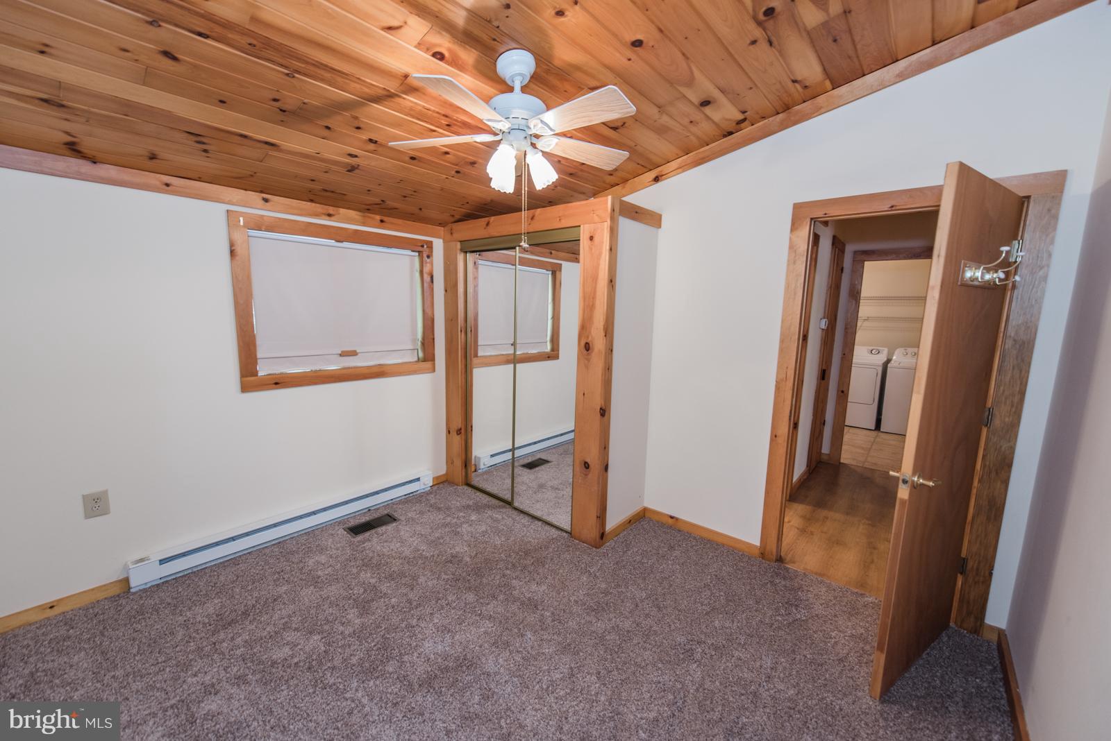 116 Hickory Hollow Road Berkeley Springs, WV 25411 - Photo 19 of 30 an empty room with windows
