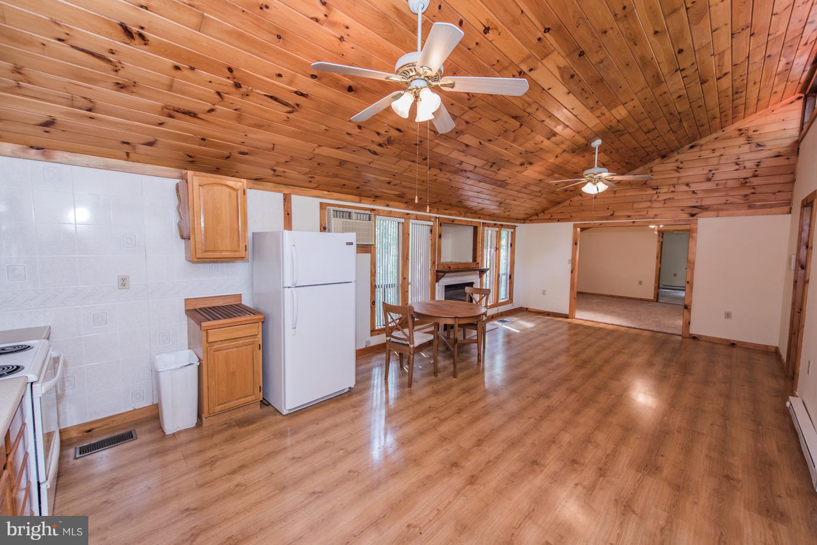 116 Hickory Hollow Road Berkeley Springs, WV 25411 - Photo 3 of 30 a view of livingroom with furniture and a kitchen