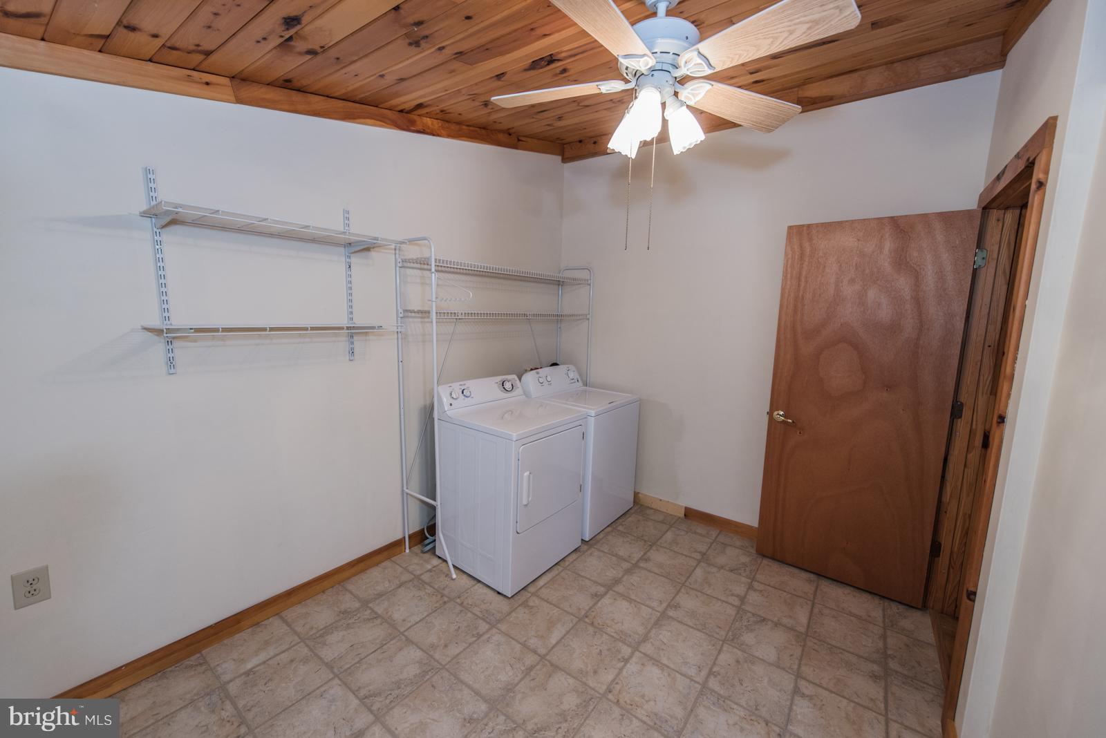 116 Hickory Hollow Road Berkeley Springs, WV 25411 - Photo 24 of 30 a utility room with cabinets