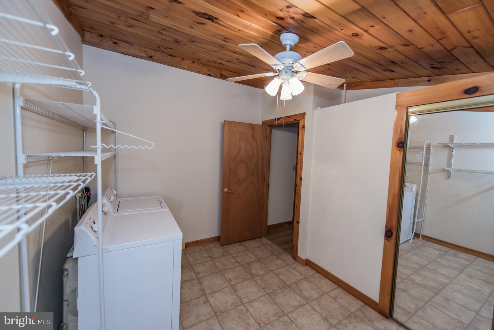 116 Hickory Hollow Road Berkeley Springs, WV 25411 - Photo 25 of 30 a utility room with dryer and washer