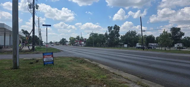 a childrens park with lots of swings and slides