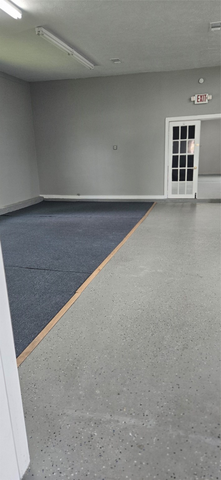 2602 North Richmond Road Wharton, TX 77488 - Photo 8 of 11 a view of an empty room with a window