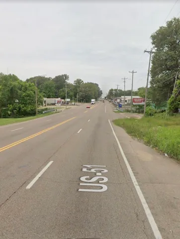 a view of a city street with a road