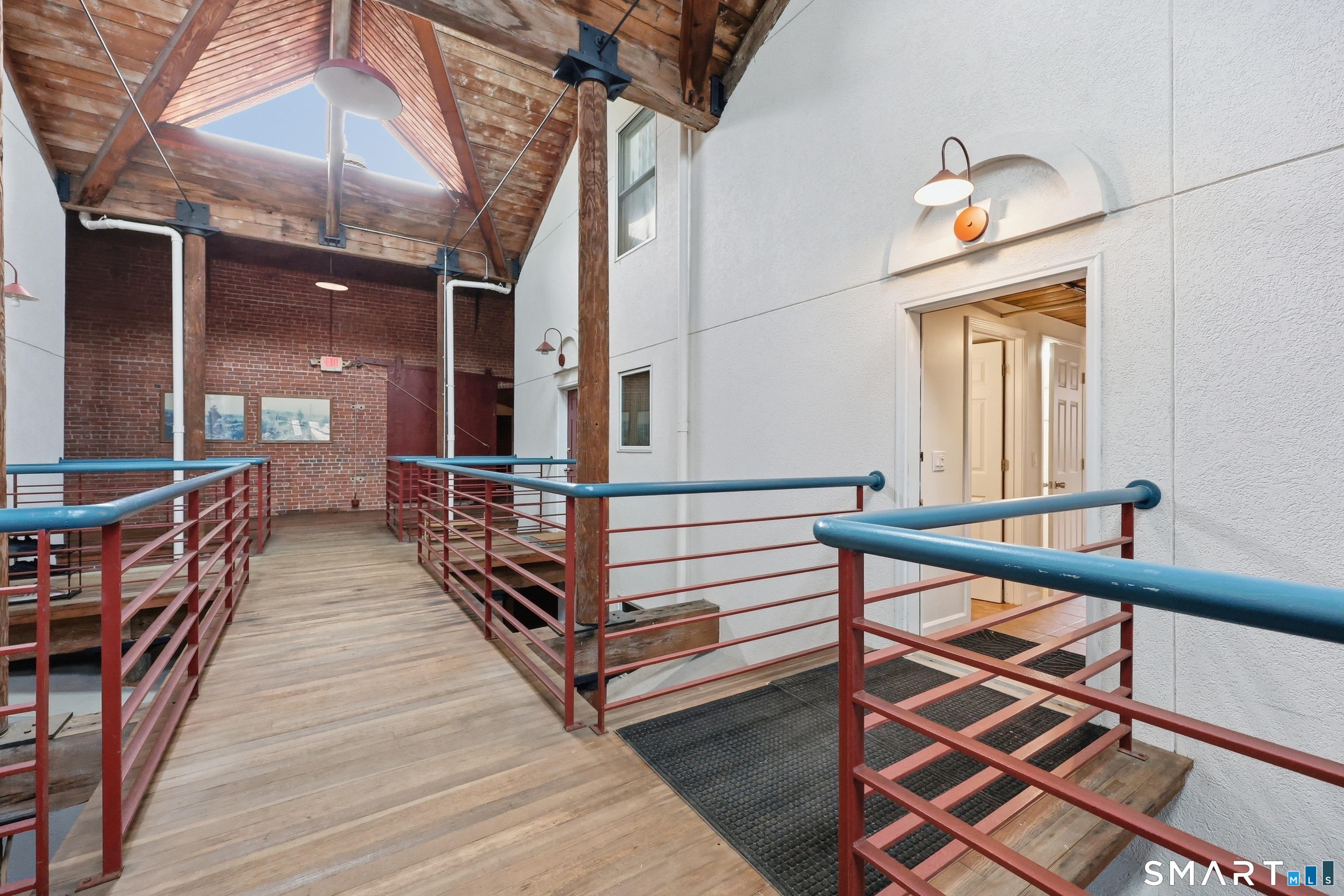 839 Main Street, Unit 78 Torrington, CT 06790 - Photo 25 of 57 a view of staircase with a table and chairs