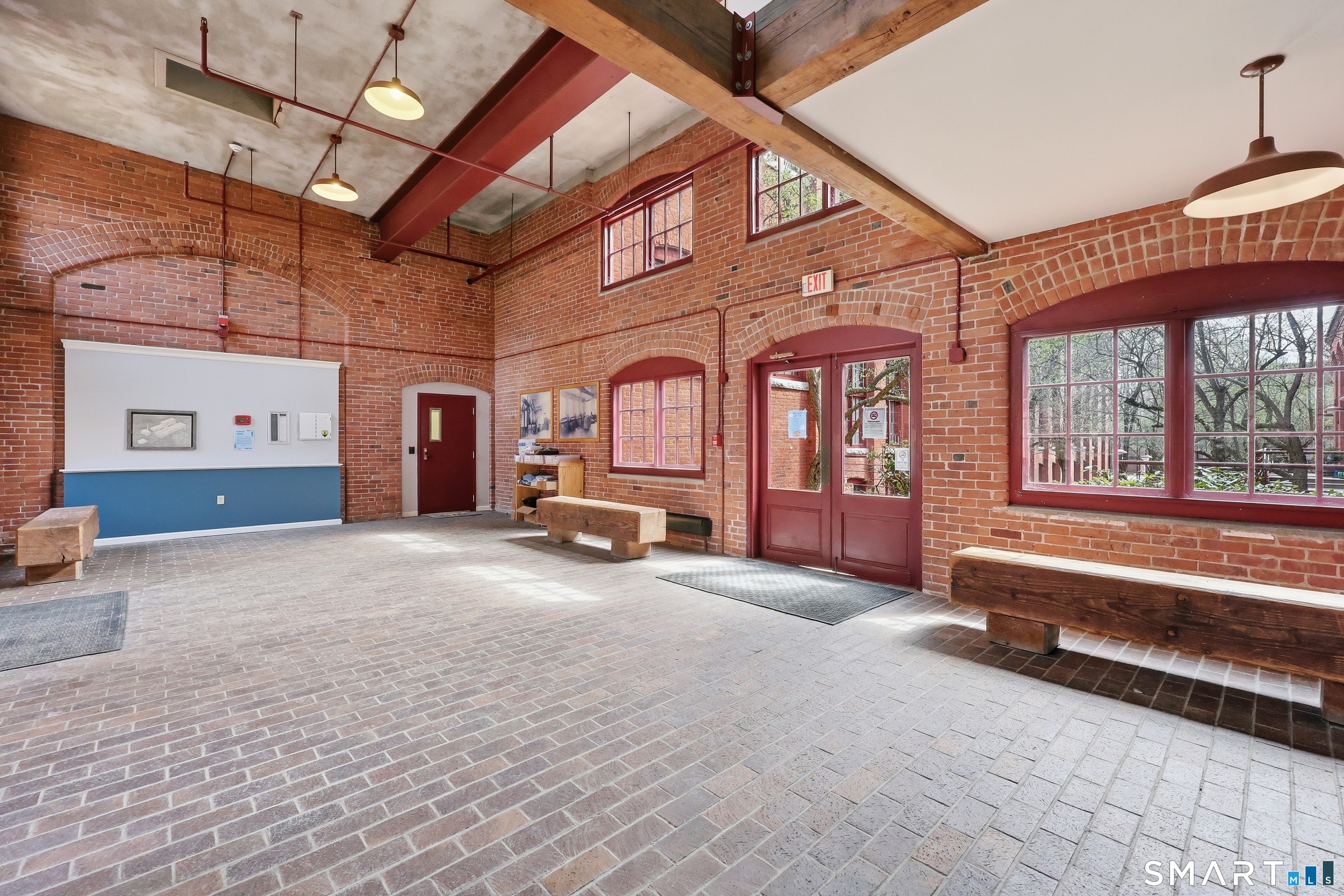 839 Main Street, Unit 78 Torrington, CT 06790 - Photo 29 of 57 a view of an empty room with a large windows