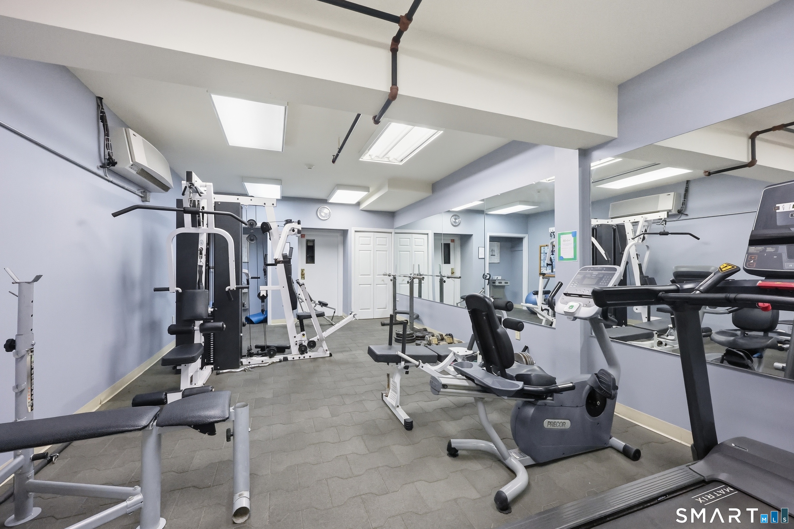 839 Main Street, Unit 78 Torrington, CT 06790 - Photo 33 of 57 a view of a room with gym equipment