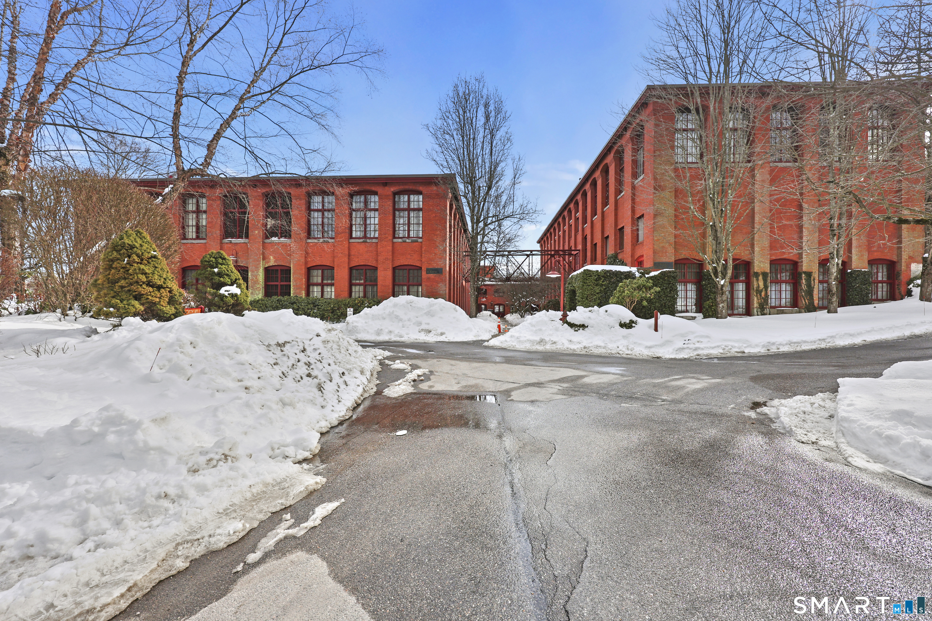 839 Main Street, Unit 78 Torrington, CT 06790 - Photo 34 of 57 a view of a street with a building in the background