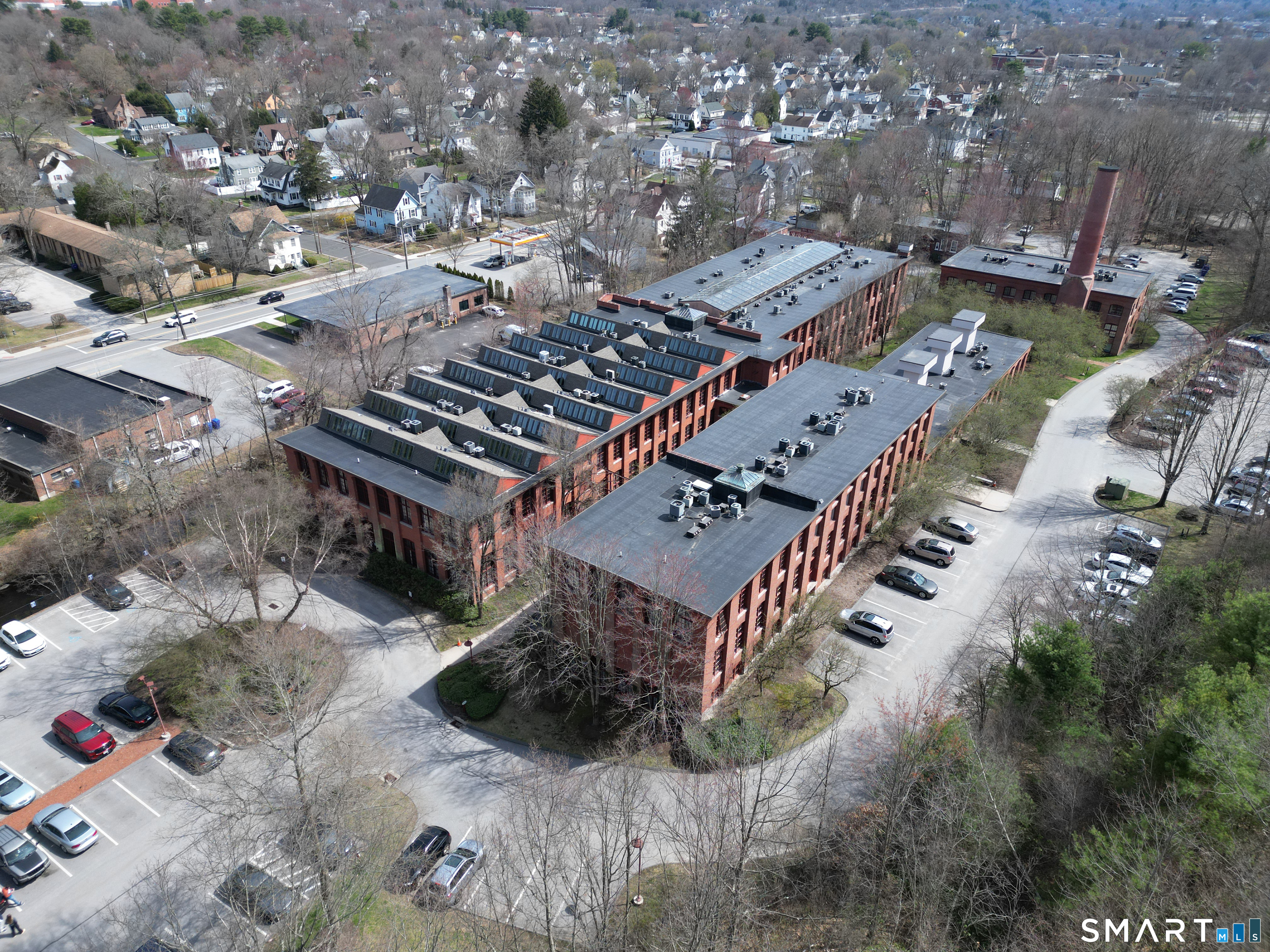 839 Main Street, Unit 78 Torrington, CT 06790 - Photo 37 of 57 an aerial view of a house with a yard