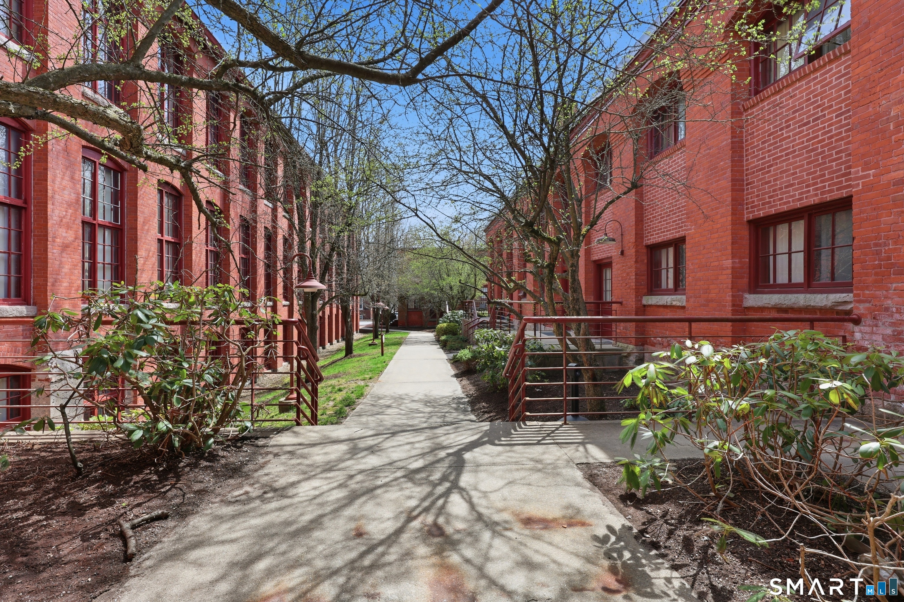 839 Main Street, Unit 78 Torrington, CT 06790 - Photo 45 of 57 a front view of a house with a yard