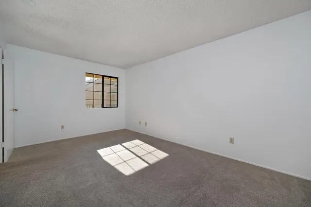 a view of a street from a balcony