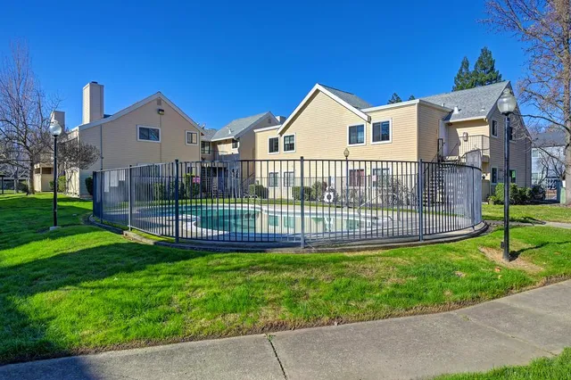 a view of swimming pool with a patio