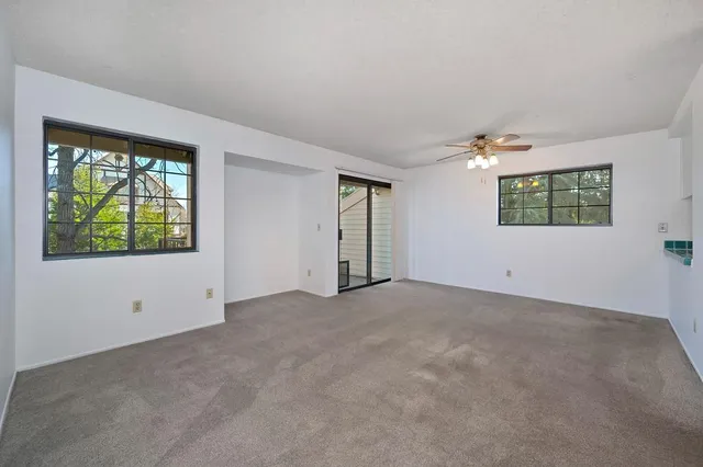 an empty room with windows