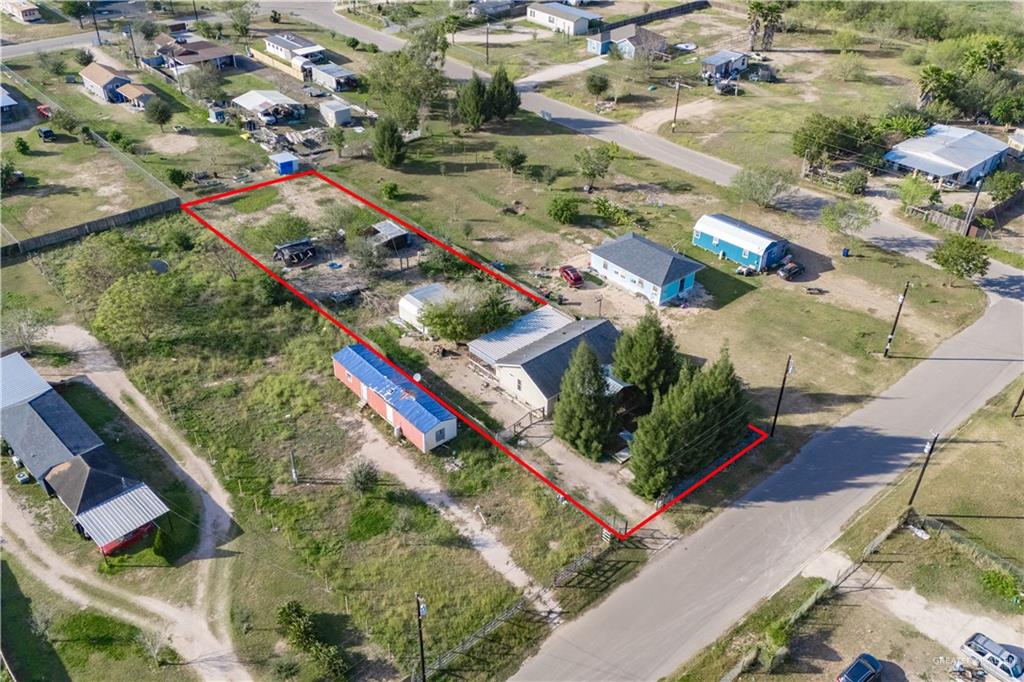 24609 Ocean Street Monte Alto, TX 78538 - Photo 22 of 31 an aerial view of residential houses with outdoor space
