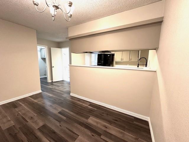 4119 Spring Meadow Lane Flower Mound, TX 75028 - Photo 11 of 28 a view of a hallway with wooden floor