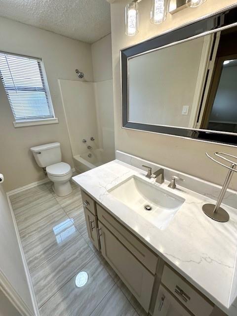 4119 Spring Meadow Lane Flower Mound, TX 75028 - Photo 14 of 28 a bathroom with a sink and a mirror