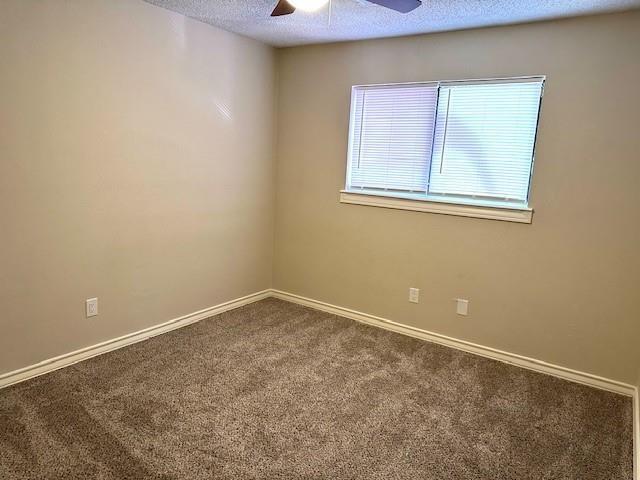 4119 Spring Meadow Lane Flower Mound, TX 75028 - Photo 17 of 28 a view of an empty room with a window