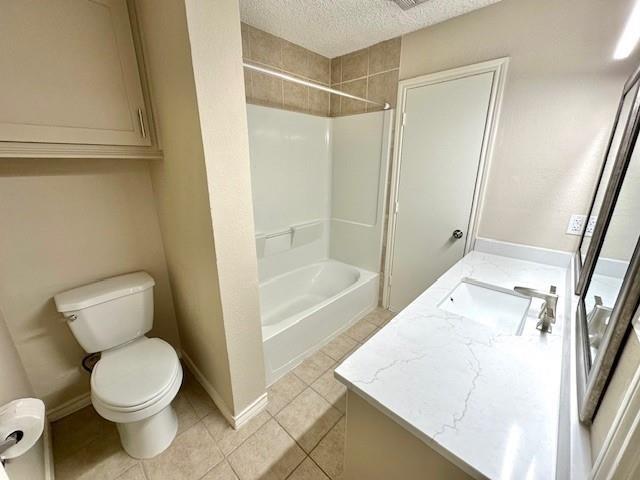 4119 Spring Meadow Lane Flower Mound, TX 75028 - Photo 20 of 28 a bathroom with a toilet and a shower