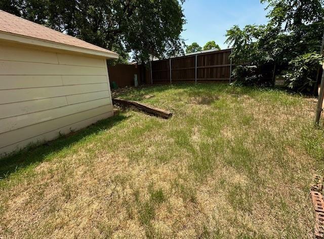 4119 Spring Meadow Lane Flower Mound, TX 75028 - Photo 26 of 28 a view of a backyard