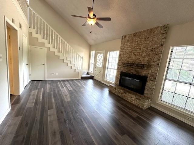 4119 Spring Meadow Lane Flower Mound, TX 75028 - Photo 3 of 28 wooden floor in an empty room with a fireplace