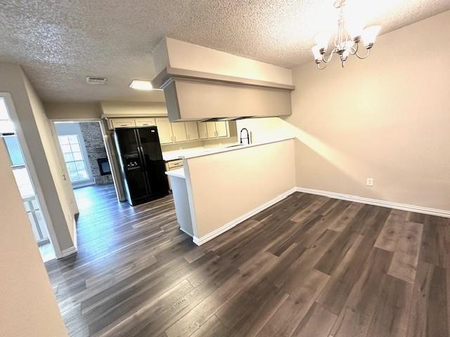 4119 Spring Meadow Lane Flower Mound, TX 75028 - Photo 10 of 28 a utility room with wooden floor washer and dryer