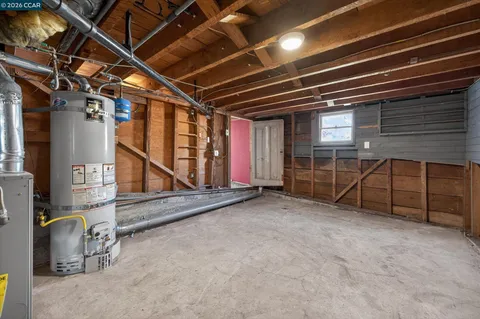 a view of an empty room with wooden walls