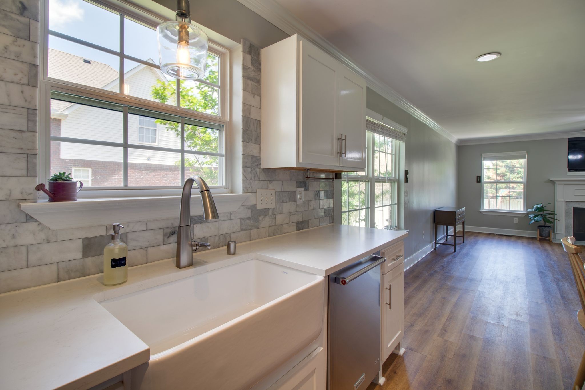 1334 Davy Crockett Drive Murfreesboro, TN 37129 - Photo 17 of 45 a kitchen with sink a large window and cabinets