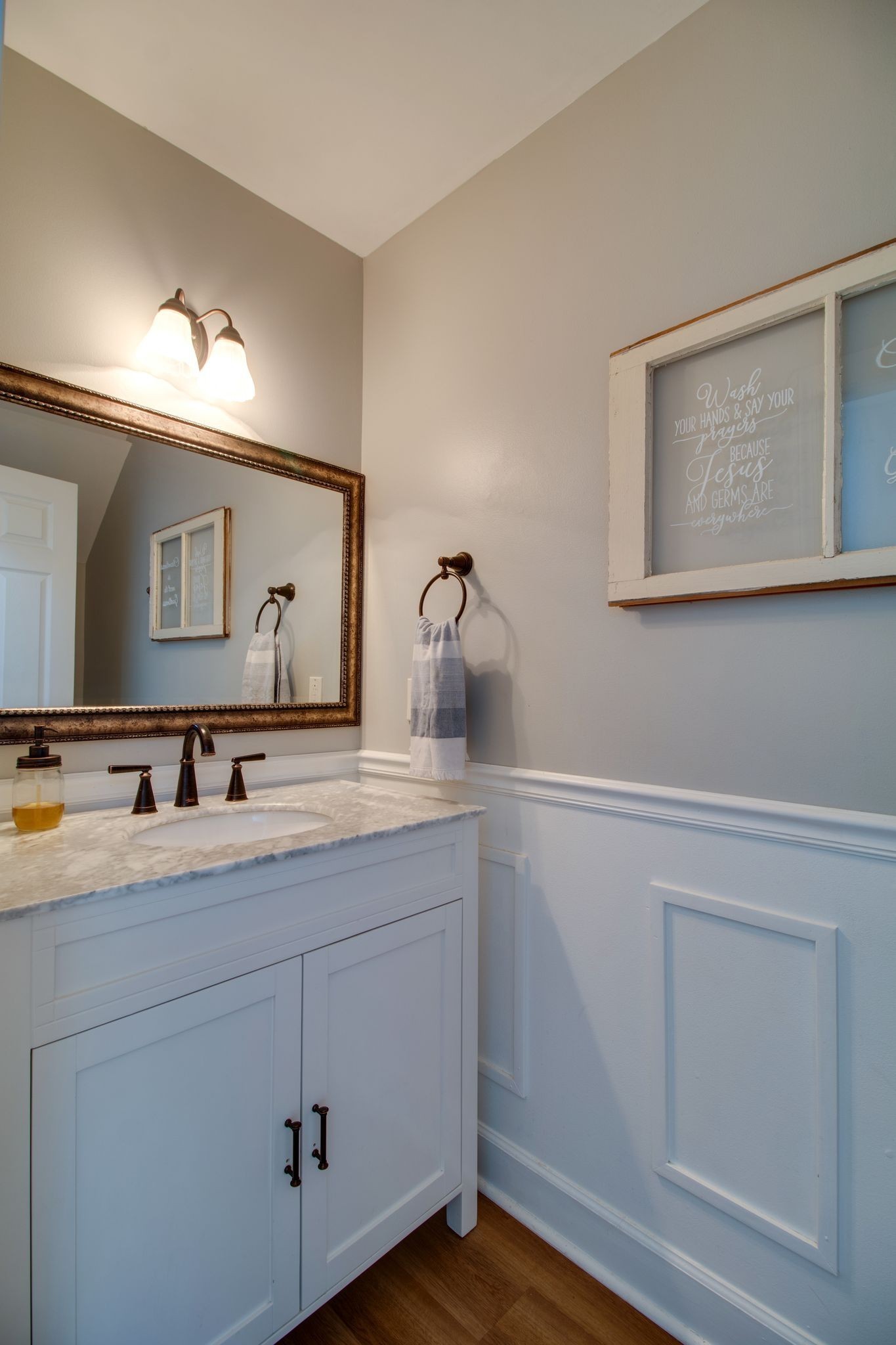 1334 Davy Crockett Drive Murfreesboro, TN 37129 - Photo 28 of 45 a bathroom with a double vanity sink and mirror