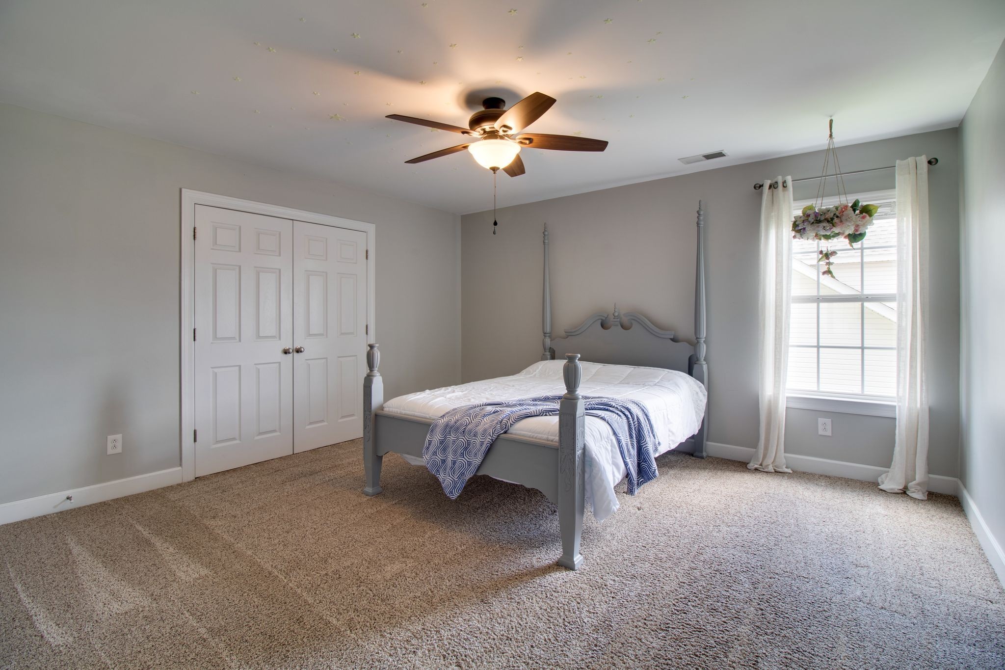 1334 Davy Crockett Drive Murfreesboro, TN 37129 - Photo 35 of 45 a spacious bedroom with a bed and a window