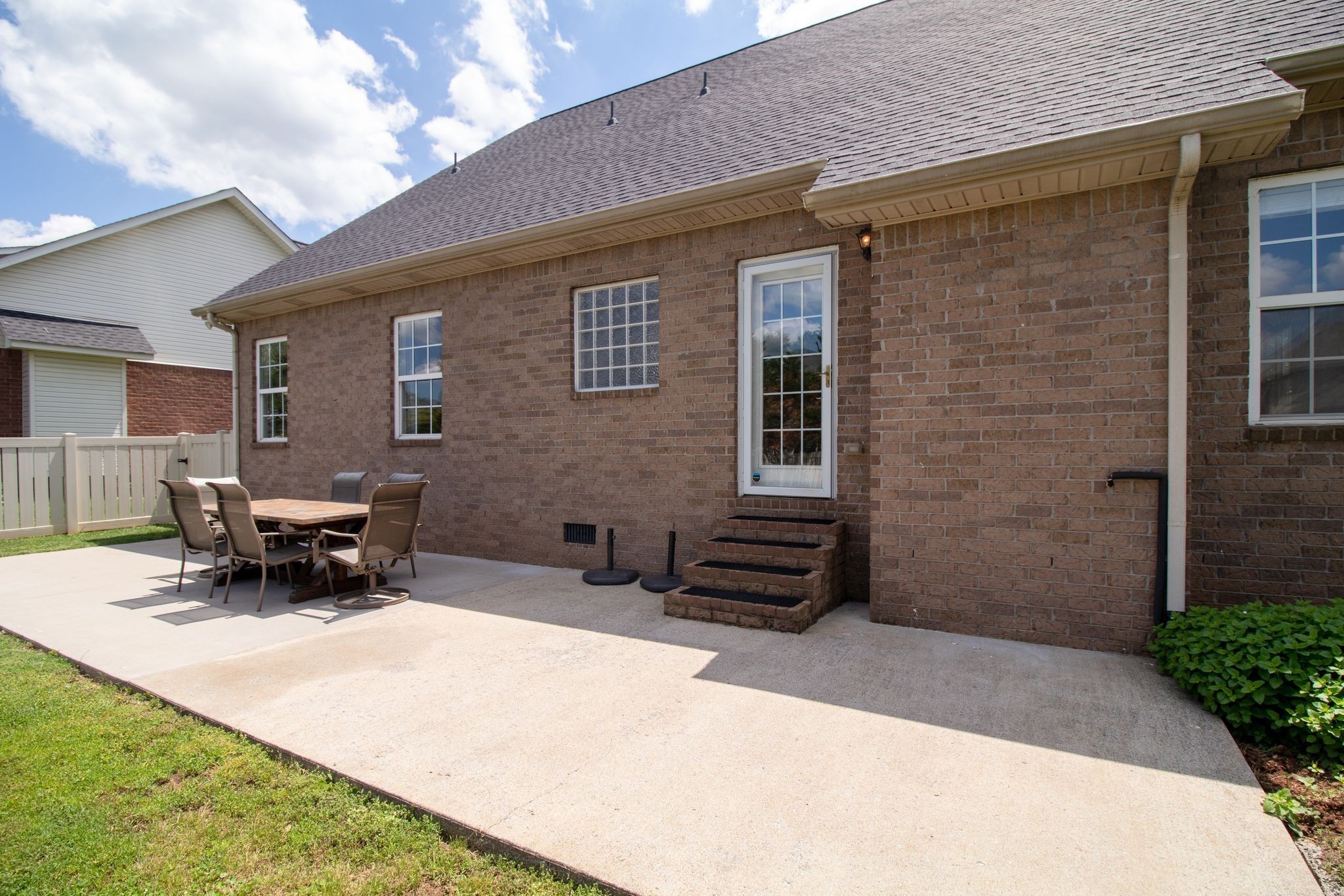 1334 Davy Crockett Drive Murfreesboro, TN 37129 - Photo 39 of 45 a backyard of a house with outdoor seating