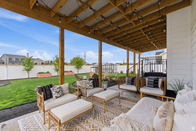 596 South Meade Street Mapleton, UT 84664 - Photo 25 of 38 Fenced backyard with a patio area, a residential view, and an outdoor living space