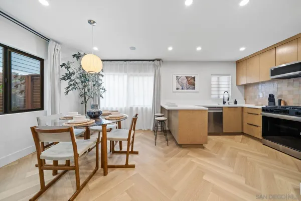 a view of a dining room kitchen and a window