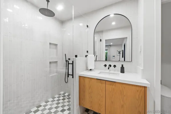 a bathroom with a sink and a mirror