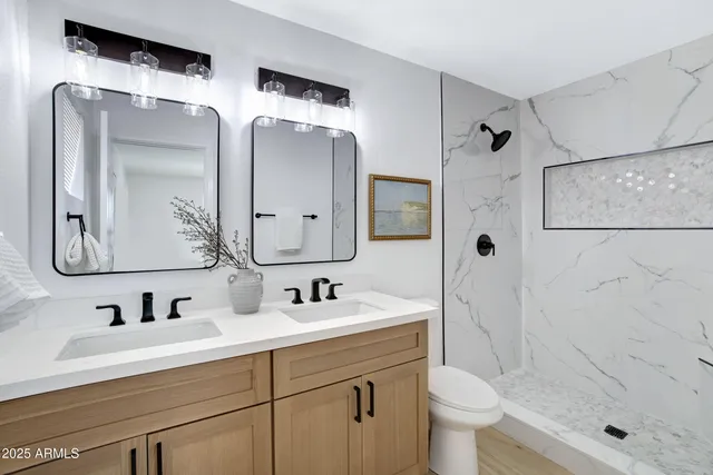 a bathroom with a sink and cabinets