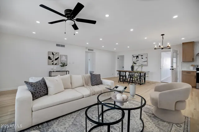 a dining room with furniture and window