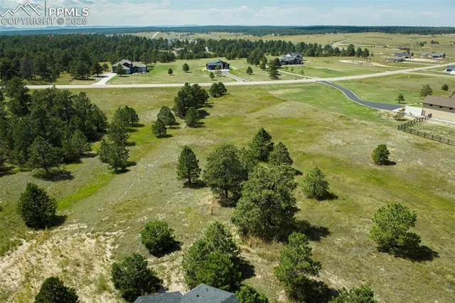 a view of a water with an outdoor space and seating area