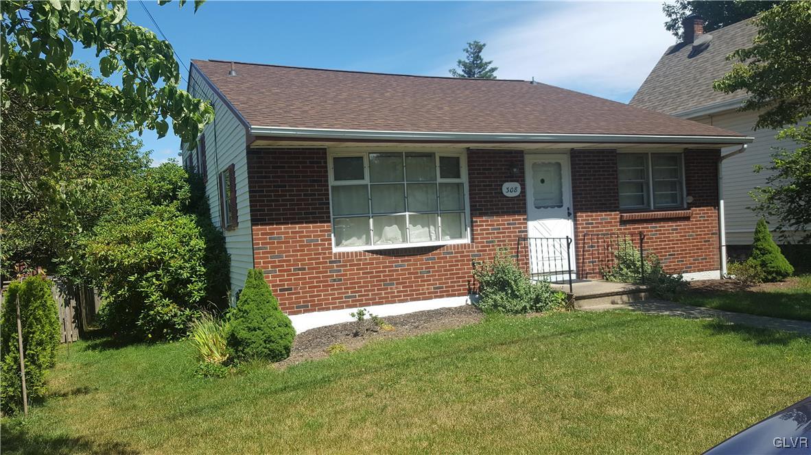 308 Fairview Road Riegelsville, PA 18077 - Photo 1 of 1 a front view of a house with garden