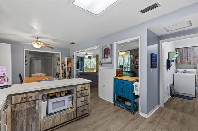 a room with furniture and a mirror