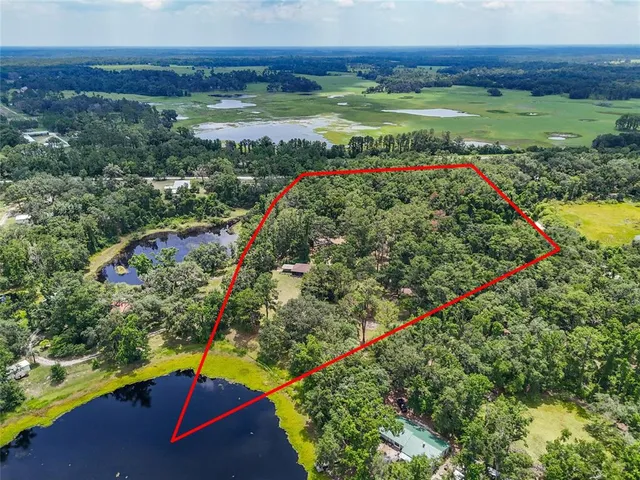 a view of an outdoor space with a swimming pool