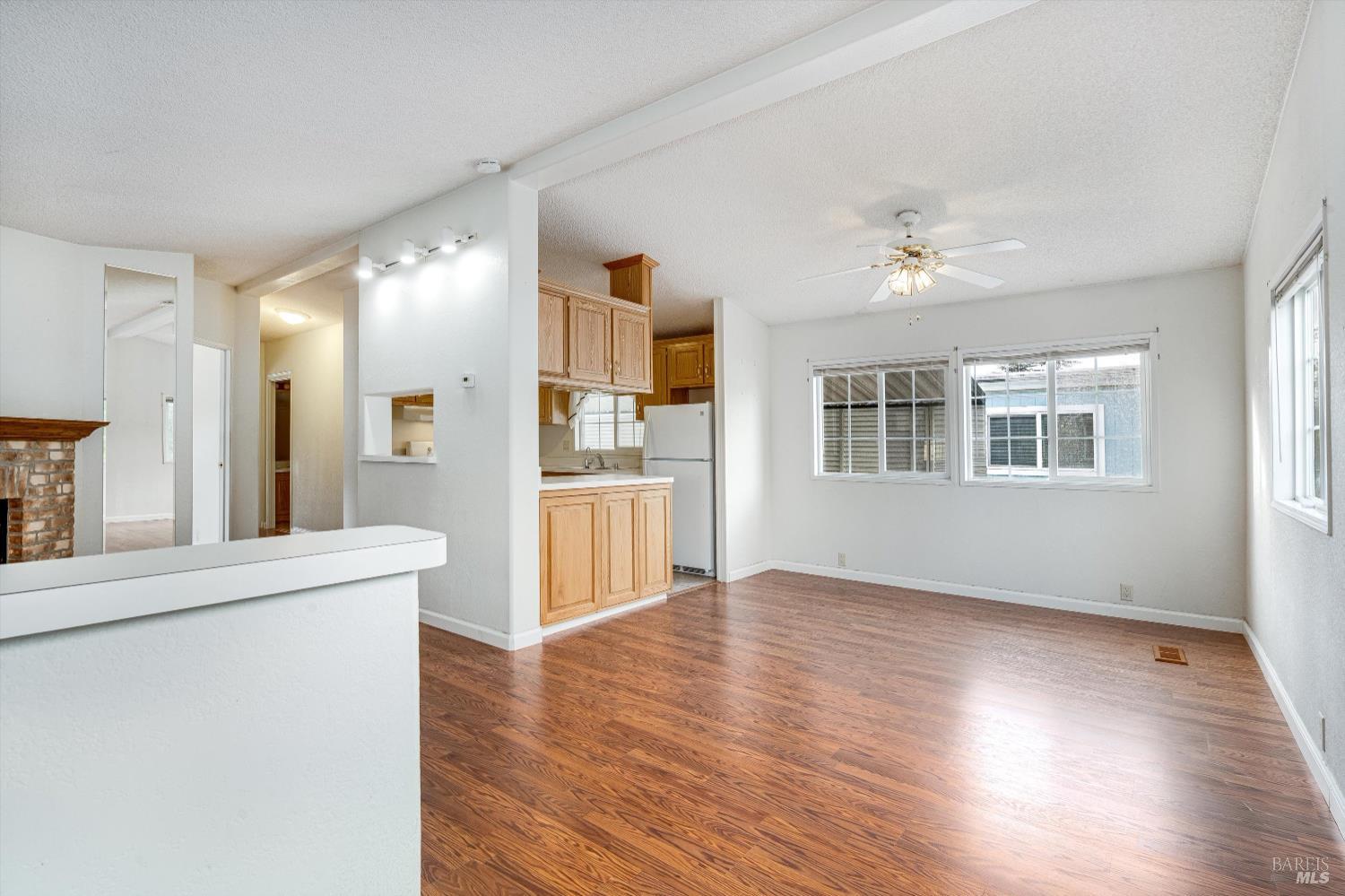 146 Westgate Circle Santa Rosa, CA 95401 - Photo 11 of 41 a view of a kitchen cabinets and wooden floor