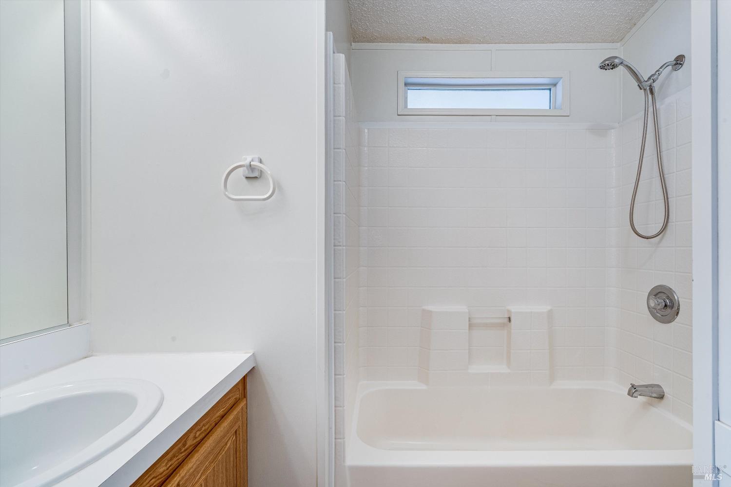 146 Westgate Circle Santa Rosa, CA 95401 - Photo 27 of 41 a bathroom with a bath tub with a shower