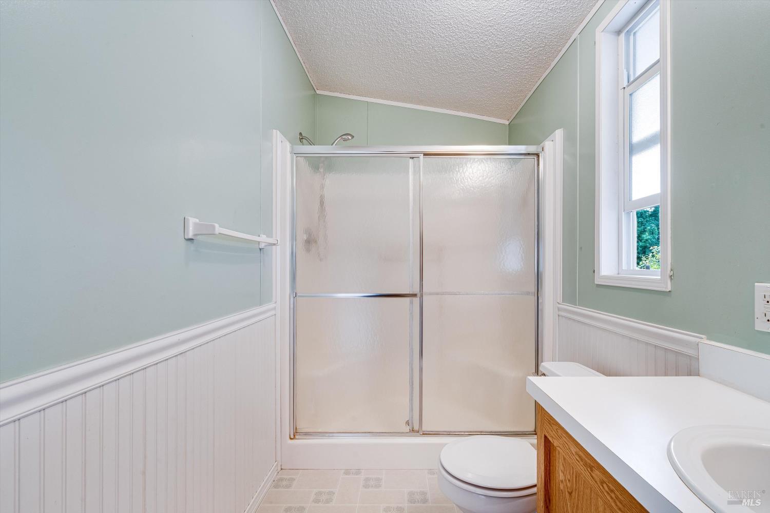 146 Westgate Circle Santa Rosa, CA 95401 - Photo 32 of 41 a bathroom with a sink a toilet and shower