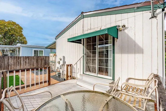 a house view with a backyard space