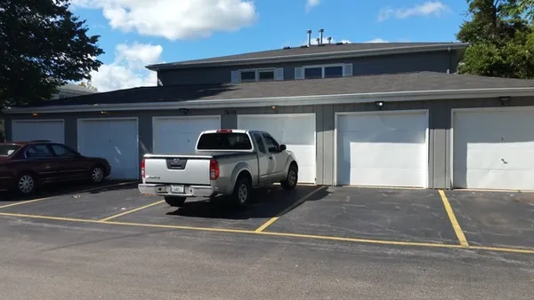 a car parked in front of a house