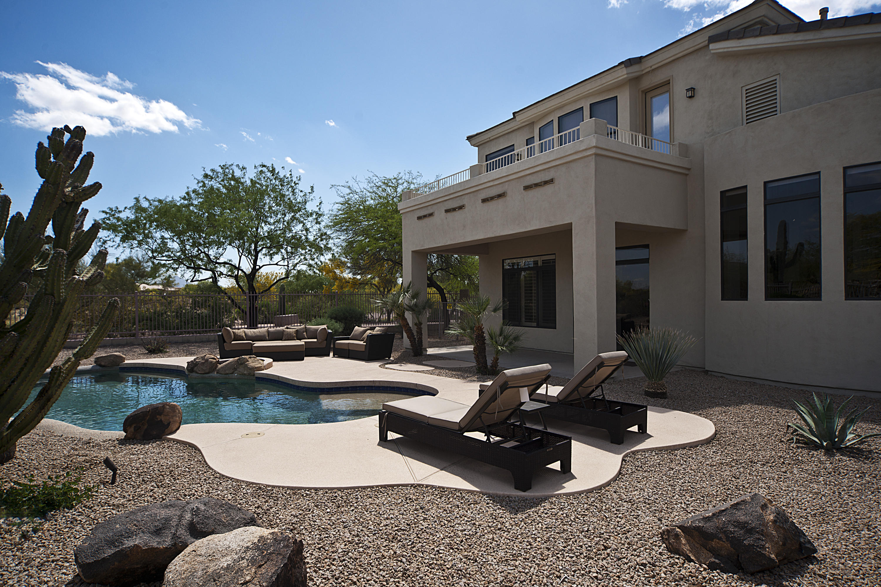 5258 East Hashknife Road Phoenix, AZ 85054 - Photo 15 of 44 RESORT POOL AND BACK OF HOME